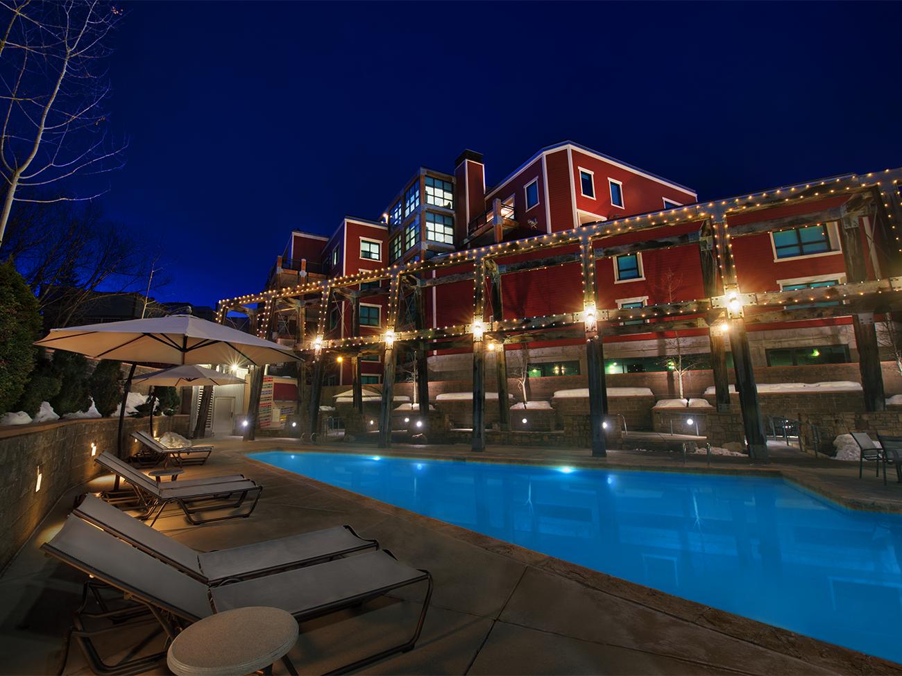 Night exterior and outdoor pool at Marriott's Summit Watch resort timeshare